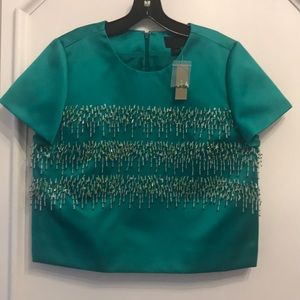 Emerald green satin embellished top